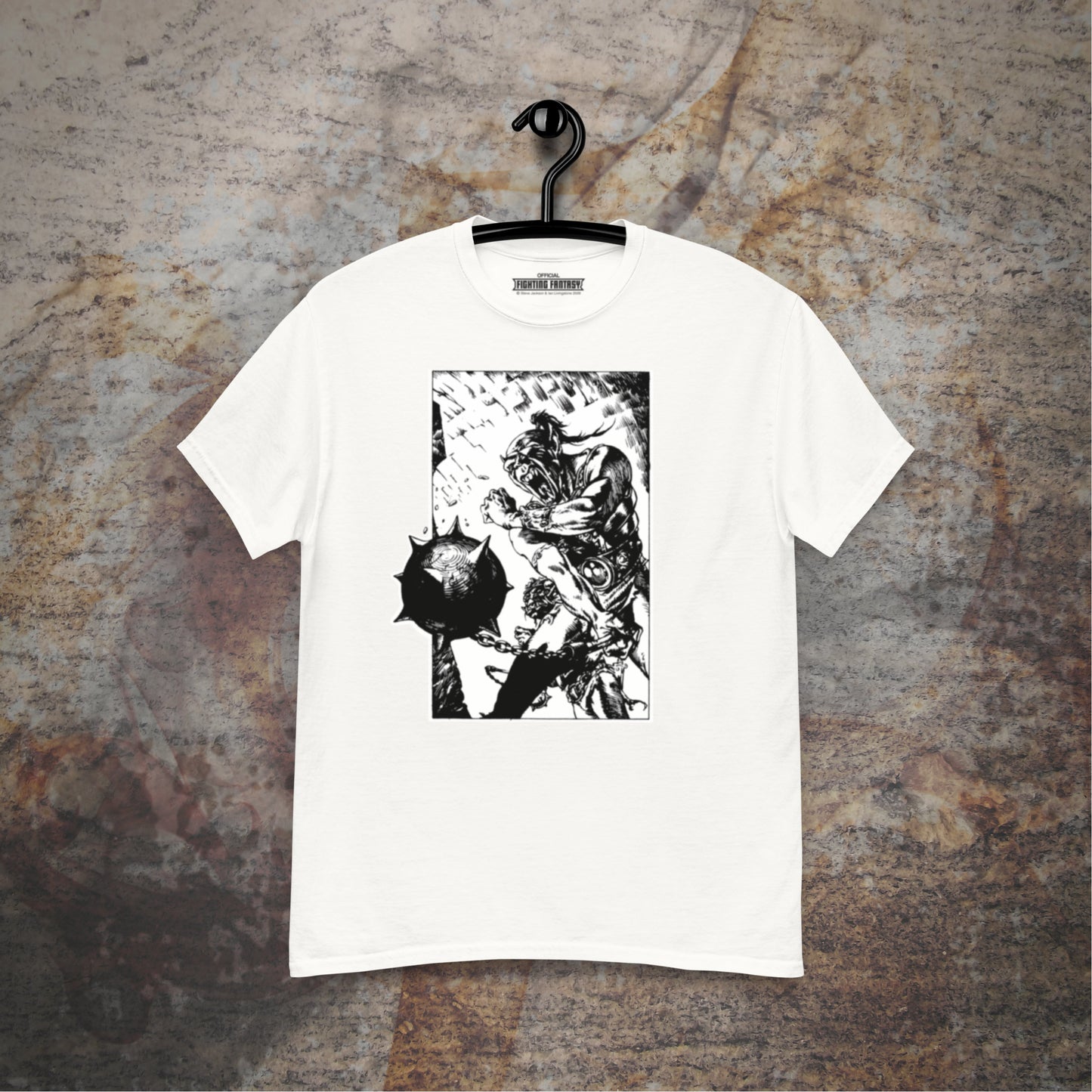 Orc Champion black t-shirt hanging in front of stone wall.