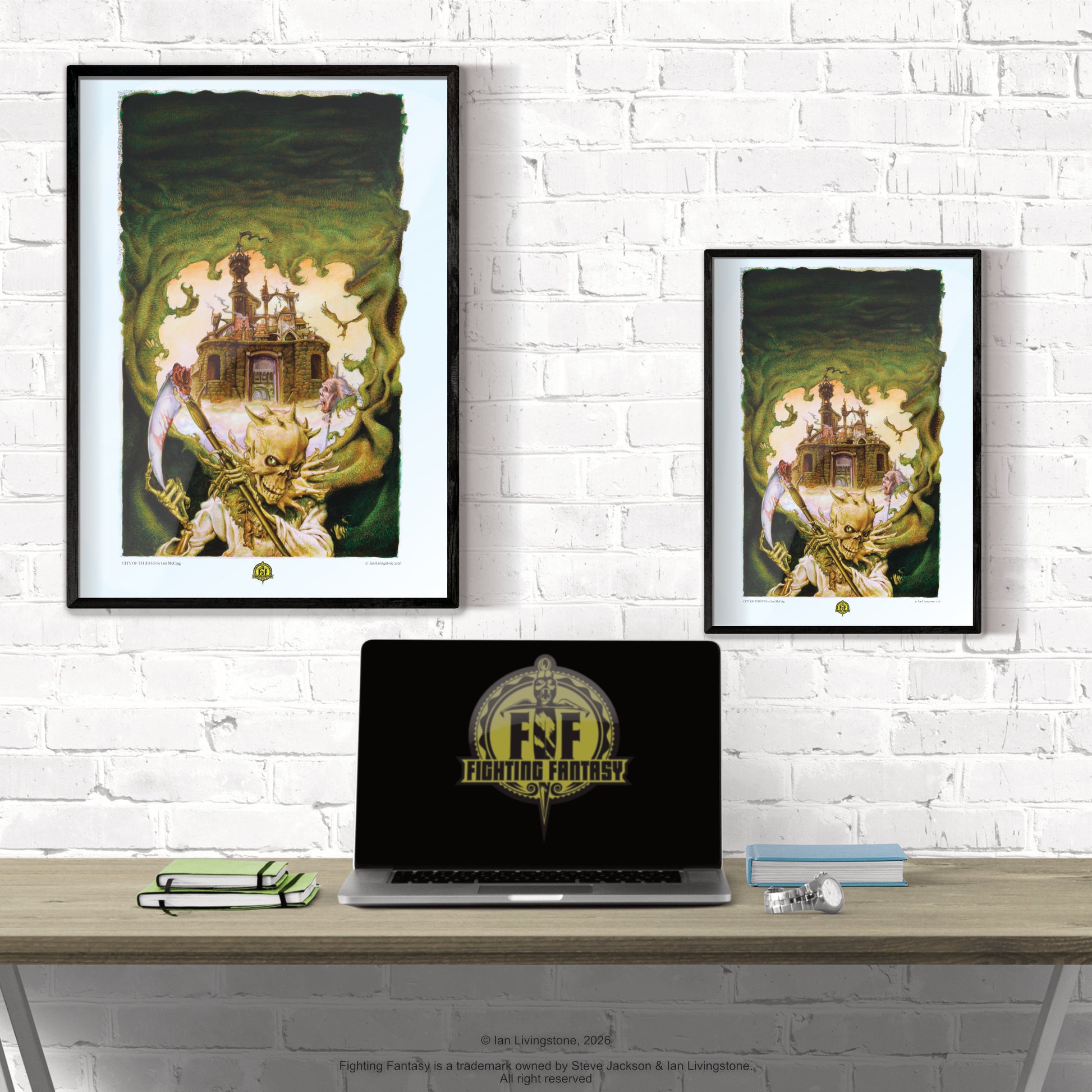Official art print of City of Thieves cover by Iain McCaig; features the skeletal Night Prince, Zanbar Bone, in tattered robes against a dark background. Shown framed on a white wall in two sizes, A3 and A4, behind a desk with a laptop featuring the Fighting Fantasy logo.