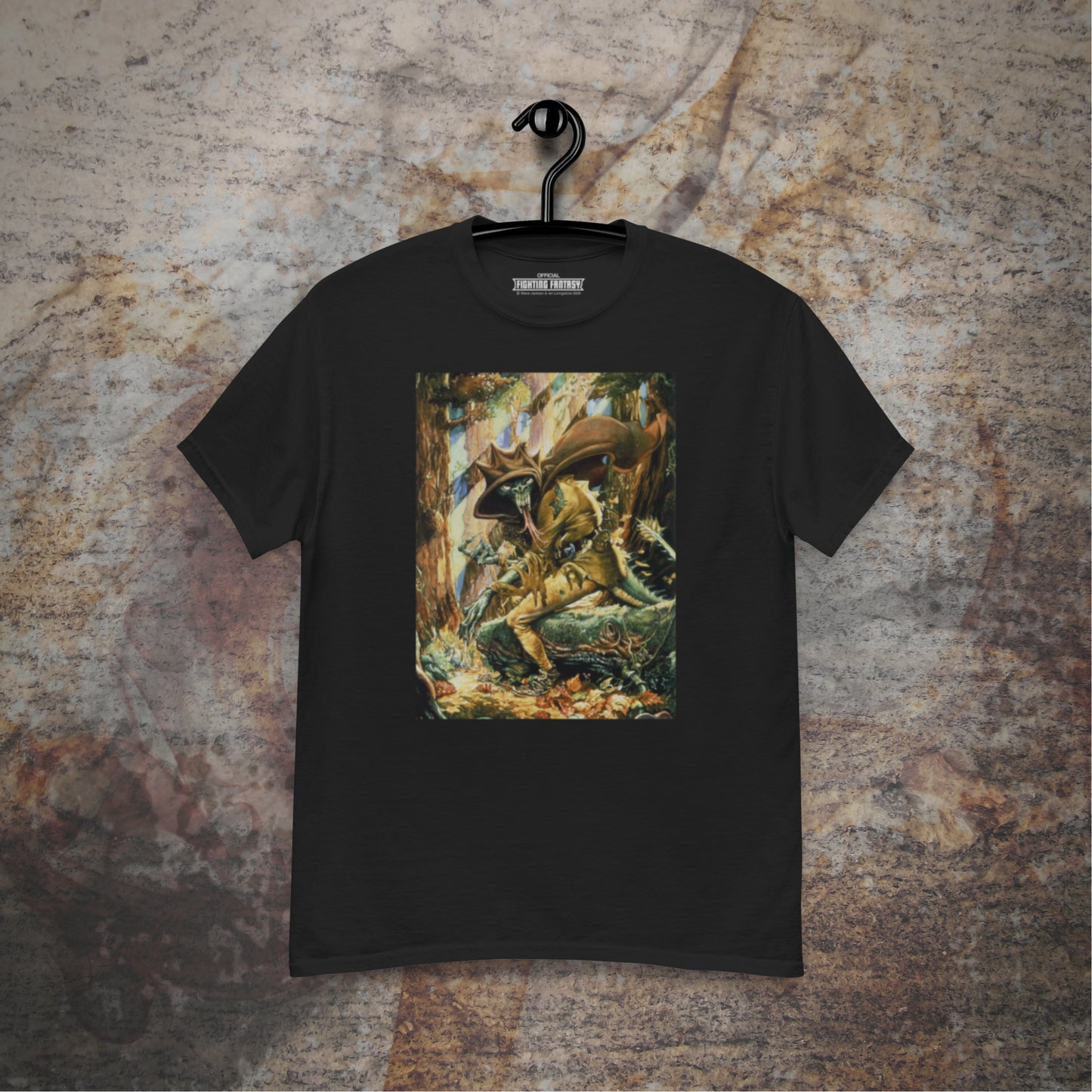 Forest of Dom design on a black t-shirt hanging in front of a stone wall background.